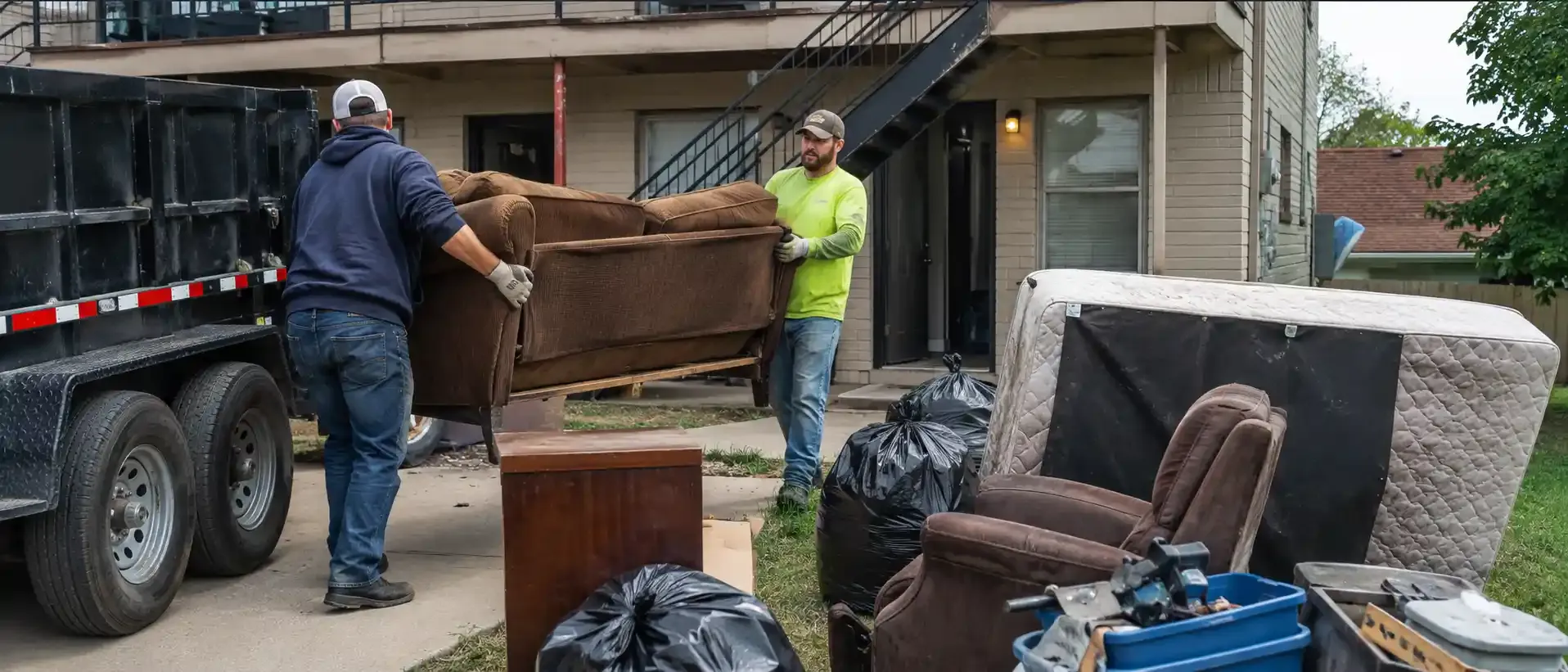 Chums Junk Removal clearing a rental property in Northwest Arkansas