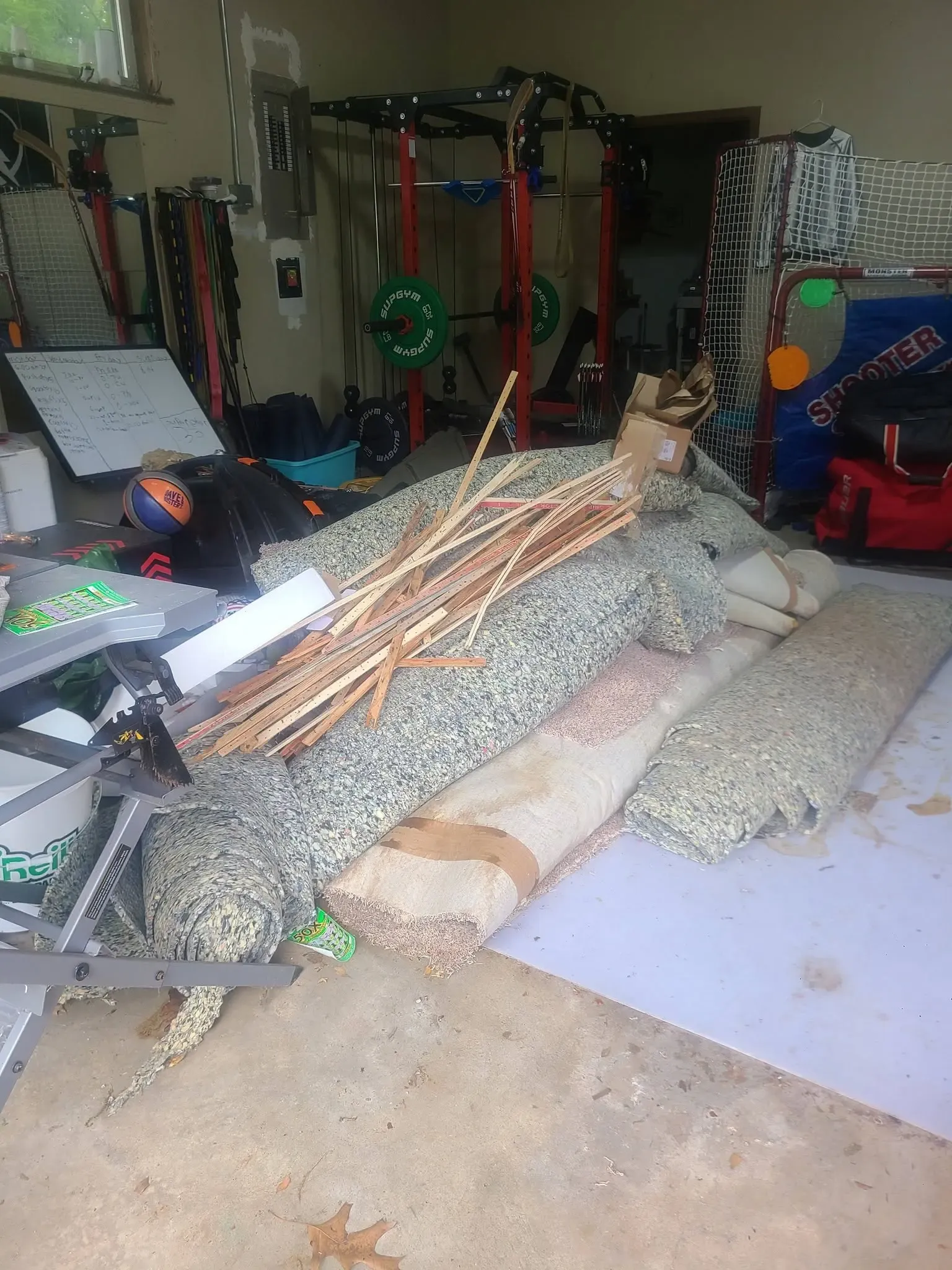 Stacked renovation debris and materials awaiting Chums pickup